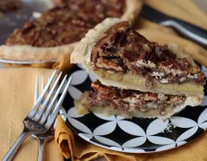 A wonderfully sweet pecan pie that is perfect. I like a small scoop of vanilla ice cream with mine! Enjoy.