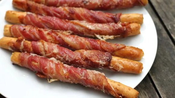 Bacon Wrapped Sesame Breadsticks