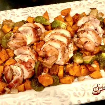 Baked Chicken Thighs With Brussels And Sweet Potato