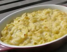 Another simple creamy mac & cheese recipe. When I was a kid my grandmother made it with American cheese and long macaroni noodles. I recently found the noodles that she used in a farmer's market - they are Greek pastichio macaroni noodles broken into 1-2 inch pieces before cooking. Give it a try with the Greek noodles if you can find them. Otherwise