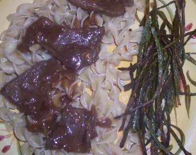 Braised Sirloin Tips Over Rice