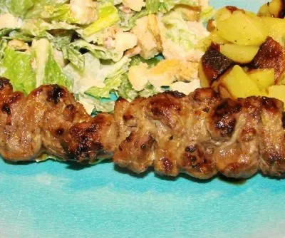 Beef skewers with thinly sliced beef sirloin and glazing them on the grill with spiced up BBQ sauce . You can serve this as an appetizer