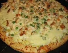 Cheesy Chicken And Artichoke Pizza
