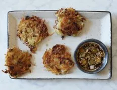 these tasty potato latkes are positively divine! Taken from the  Potato Harvest Cookbook  by Ashley Miller.A fine example of  fusion  cooking