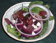 This was a perfect salad for DH: good ingredients and a non-intrusive vinaigrette.  I think my reservation stemmed from my lackluster feta cheese -- I yearned for blue cheese or a jazzier version of feta cheese.  I should have stopped toasting the pecans at 8 minutes