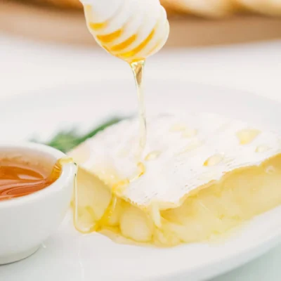 Decadent Baked Brie With Honey And Almonds