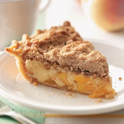 Deliciously Creamy Peach Pie With A Sour Cream Twist