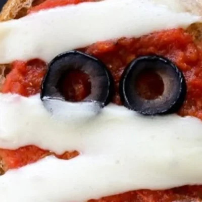 French Bread Pizza Mummies