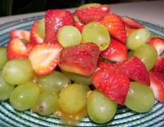 Fresh Strawberry And Grape Salad With Honey-Lime Dressing