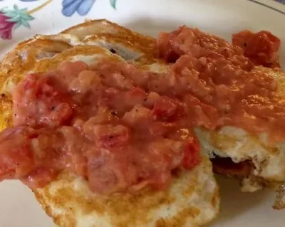 Fried Grit Cakes With Eggs And Tomato Gravy
