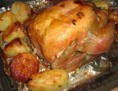 Onion Stuffed Roast Chicken With Potatoes