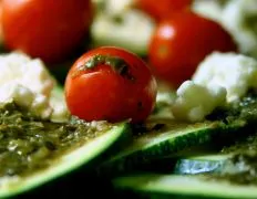 Pesto Zucchini And Grape Tomato Medley With Feta Cheese
