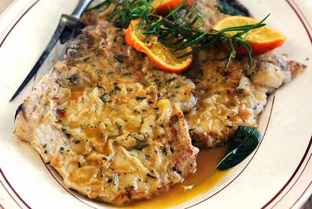 Pork Steaks With A Orange Rosemary Sauce