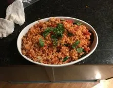 Family Spanish rice recipe with Rotel and bacon. Don't leave out the bacon fat and butter