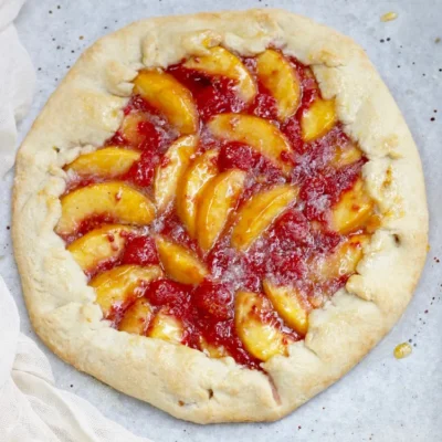 Rustic Nectarine And Raspberry Crostata With