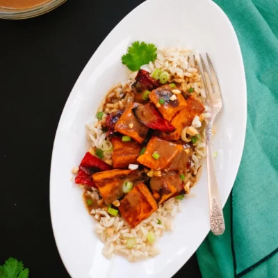 Sizzling Peanut Chicken With Rice: A Spicy Delight