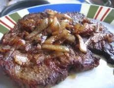 Succulent Pan-Seared Steak with Sweet Caramelized Onions