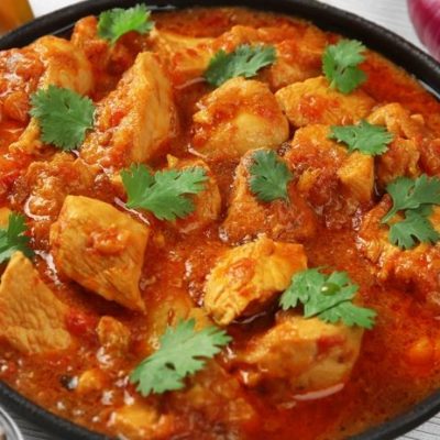 African Chicken Curry In Rich Palm Oil