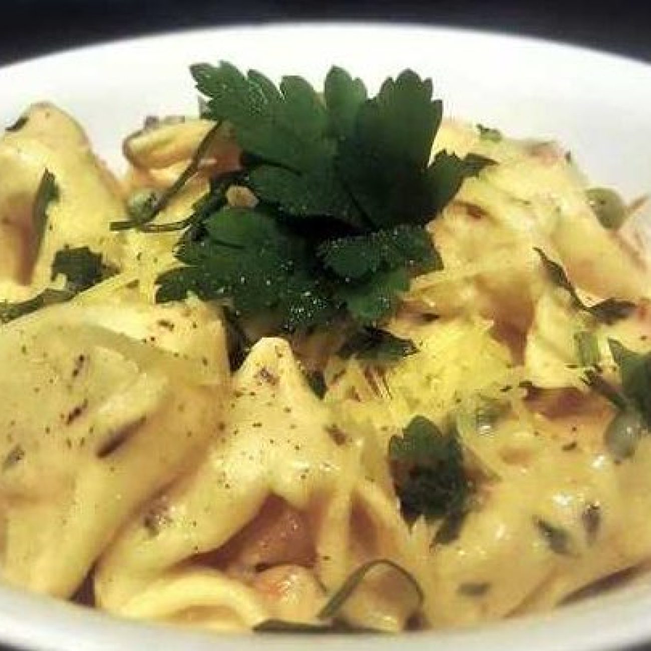 Cheesy Tortellini with Prosciutto in a Creamy Sauce