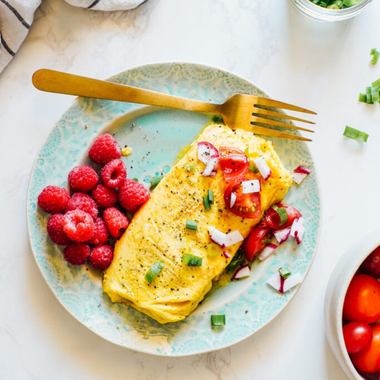 Eggs And Sausage Omelet With Tomatoes And