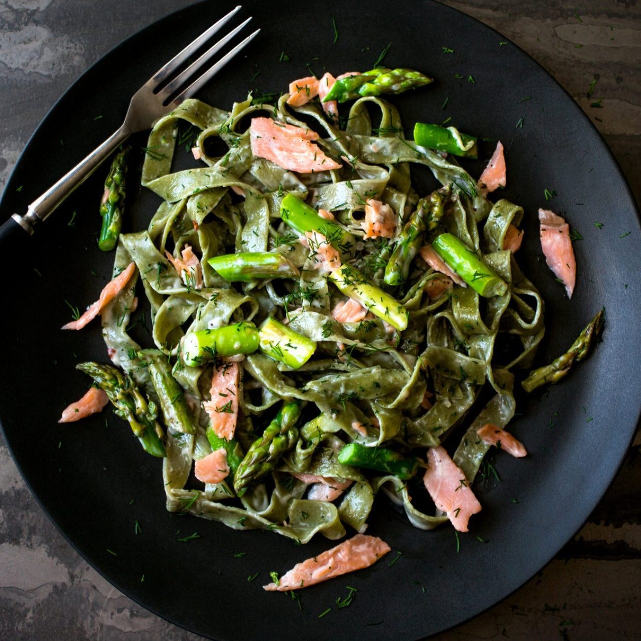 Fresh Green Asparagus On Smoked Fish