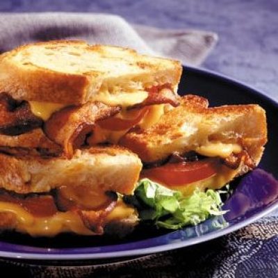 Grilled Cheddar And Tomato Sandwiches With