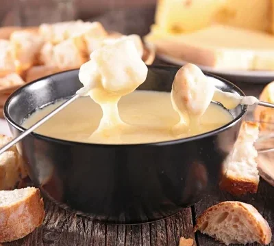 Ultimate Swiss Cheese Fondue Bread Bowl Recipe
